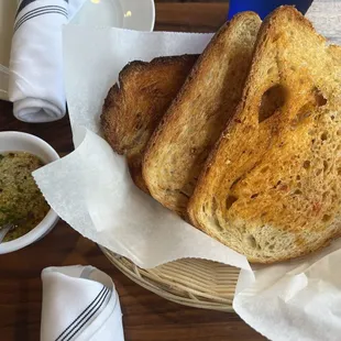 Bread with dipping oil and herbs.