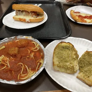 Spaghetti with Meatballs, garlic bread and meatball sub