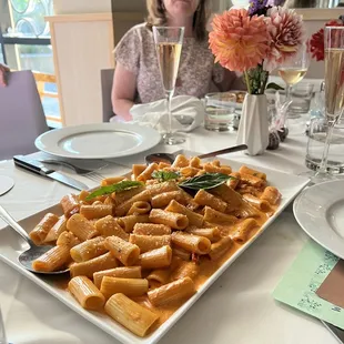 Giant platter of pasta served at baby shower