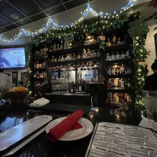 a bar with bottles of liquor