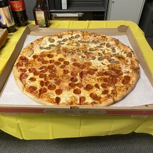 Huge pizza with multiple toppings