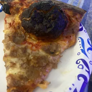 Burnt slice of pizza