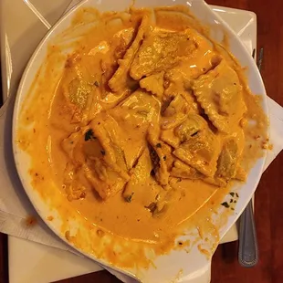 I was so excited to eat the Ravioli with vodka sauce, I stopped to take the picture after I already started