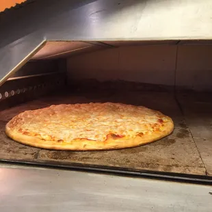 a pizza in an oven