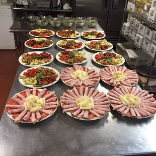 a variety of meats on plates