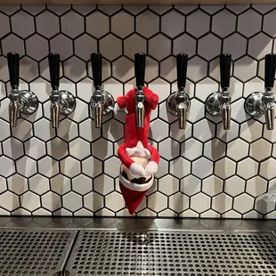 &quot;Mystical sips and hoppy trips: 
The Elf on the Shelf has hit the wall... determined to try &apos;em&apos;all!!