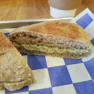 Green Eggs (eggs made with pesto topped with mozzarella) on a Wheat Philly Muffin