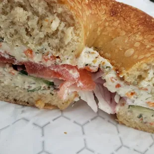 Loaded bagel. Veggie cream cheese, red onion,  tomato, cucumber. Awesome!!