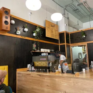 Our friendly baristas serving up excellent coffee drinks