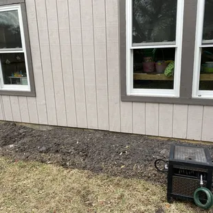 the back of a house with a heater