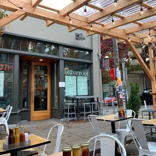 tables and chairs outside a restaurant