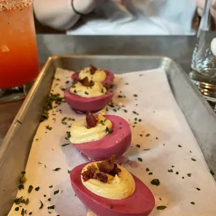 Pink devilled eggs