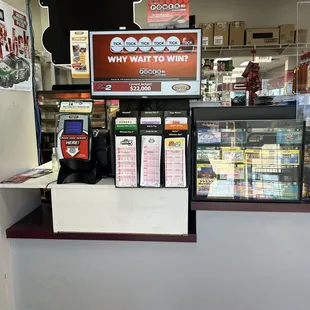 a counter with a sign that says why wait to win?