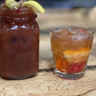 a glass of iced tea and a jar of iced tea