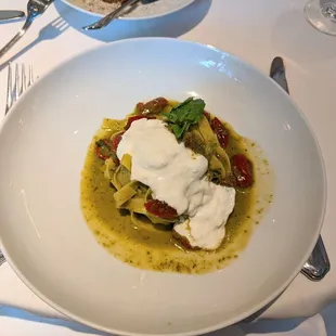 Tagliatelle with pesto, cherry tomatoes and burrata