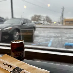 the view of a parking lot through a window