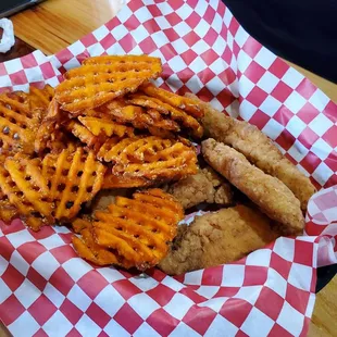 Chicken fingers and sweet potatoes fries