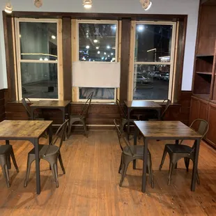 a room with tables and chairs