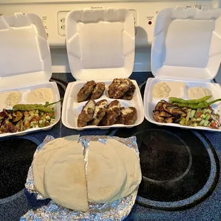 Two meals (meat for both put into one box for us), this shows 2  Kebab Plate dinners