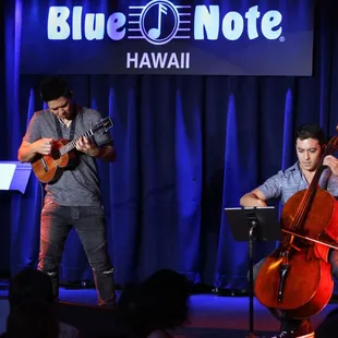 Mana Music Cellist Joshua Nakazawa performing with Jake Shimabukuro at the Blue Note Hawaii