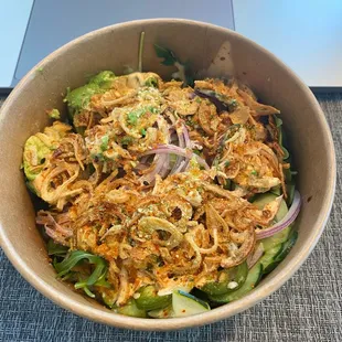 Lava Tuna Poke with cucumber, avocado, crispy shallots, scallions with 1/2 rice, 1/2 arugula