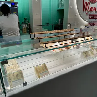 a display of various types of sandwiches