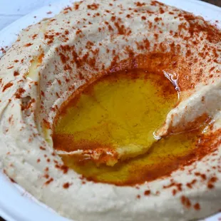 a hummusl in a bowl