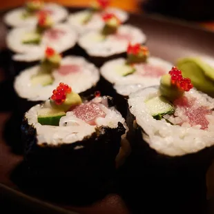 Four Seasons Oahu roll (ahi, shiso, cucumber, tobiko, avocado wasabi aioli)