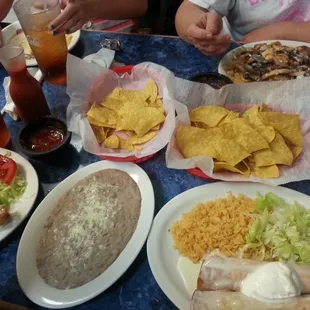 Pollo Fundido, refried beans, Mexican feast.  The food was beyond awesome!