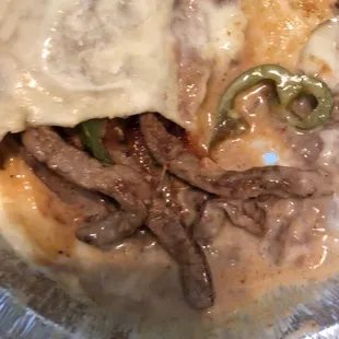 Texacano burrito with steak and beans.