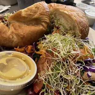 Egg Salad on a crescent roll with side salad