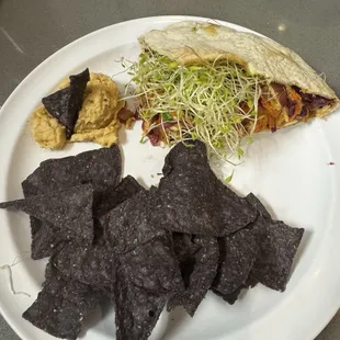 Cajun chicken pita with chips and hummus