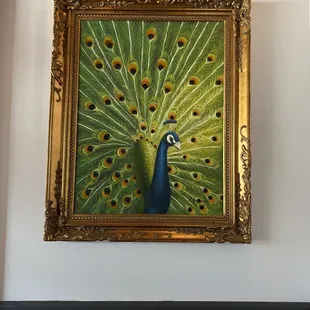 a painting of a peacock