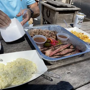 a tray of food on a picnic table