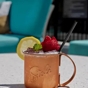 Did you know our drinks are served poolside?! Here's a fan-favorite called "Finally... we strawberrly made it!