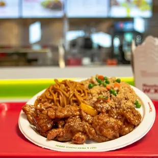 a plate of food on a red tray