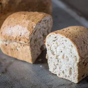 a loaf of bread with a bite taken out of it