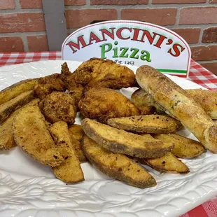 Broasted Chicken &amp; Potato Wedges served with breadsticks