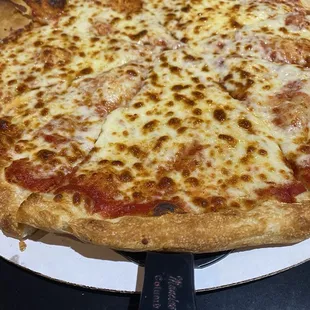 Large cheese pizza from Mancino's in Columbus, Indiana.