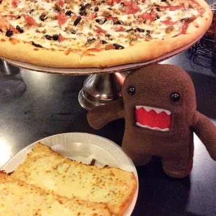 Mancino's Pride pizza and Garlic Cheese Bread