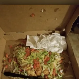 Half eaten food and dirty utensils that was given to me at the time of pickup