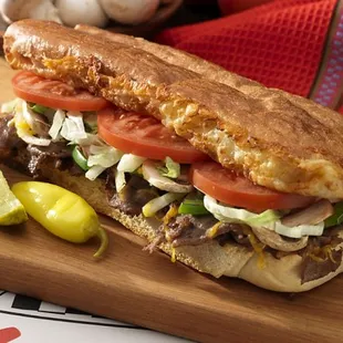 a steak sandwich on a cutting board