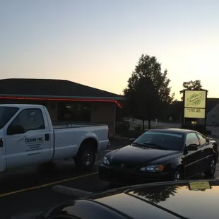 two trucks parked in a parking lot