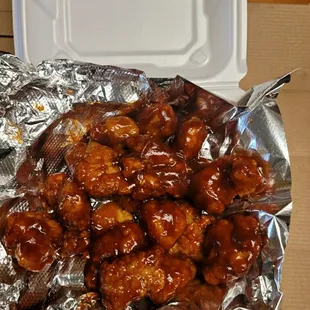 Boneless chicken wings with BBQ sauce