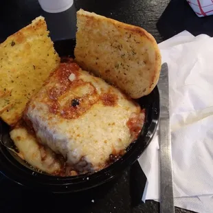 Very small serving of lasagna without side salad for $9