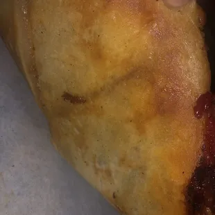 Raw and uncut pizza dough.