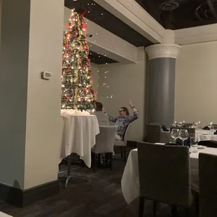 a christmas tree in the dining room