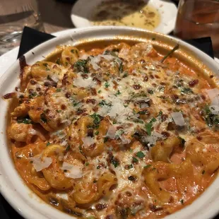 Baked Tortellini Rustica Cheese Tortellini, Grilled Chicken, Mushroom, Spinach, Roasted Red Pepper Cream Sauce