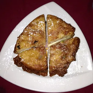 A Proper Monte Cristo or Croque-monsieur, although I would prefer it with raspberry preserves as opposed to maple syrup.