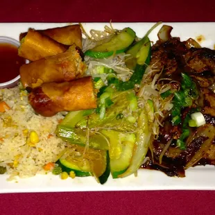 Lé&apos;s Speciality: Beef stir fry vegetables, veggie and pork spring rolls, chicken fried rice - just tasty!